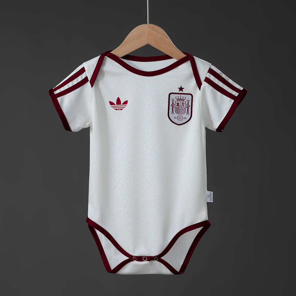 España 2026 | Bebé Visitante